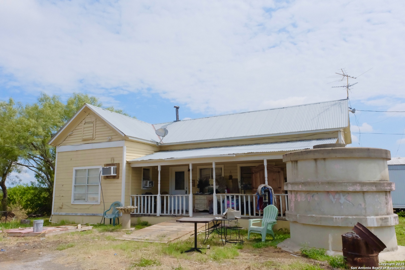 17585 Fargoer Way Marion, TX 78124 - Photo 4 of 34 a front view of a house with a yard