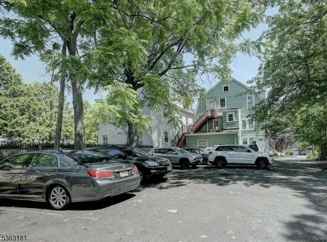 a car parked in front of a house