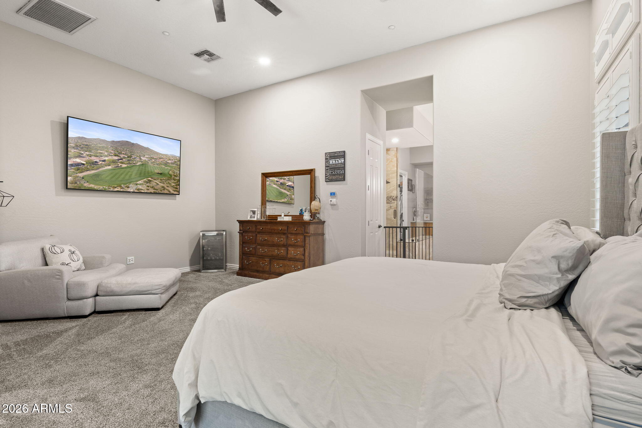 41619 North River Bend Road Anthem, AZ 85086 - Photo 54 of 84 a bedroom with a bed and a couch