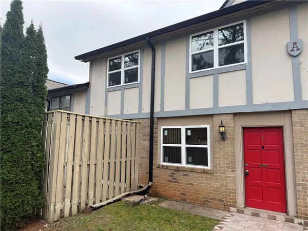 a house view with a outdoor space