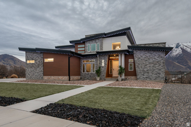 262 North Santa Fe Drive Mapleton, UT 84664 - Photo 3 of 28 Contemporary home with stone siding, a mountain view, and a front yard