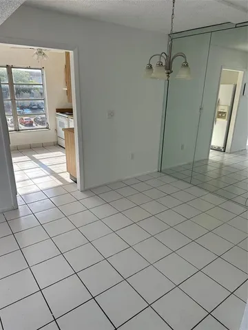 a view of a livingroom and window