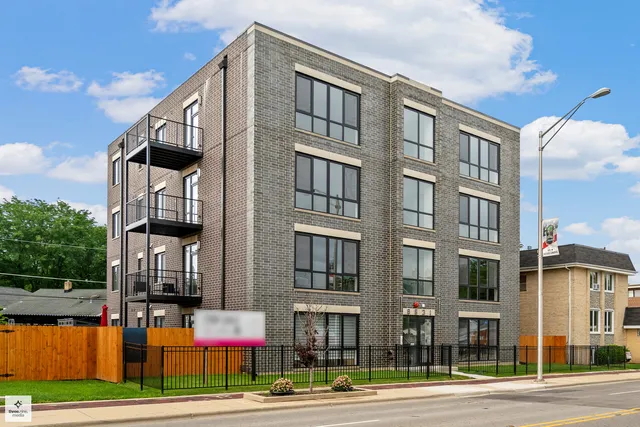 a view of a building and a street