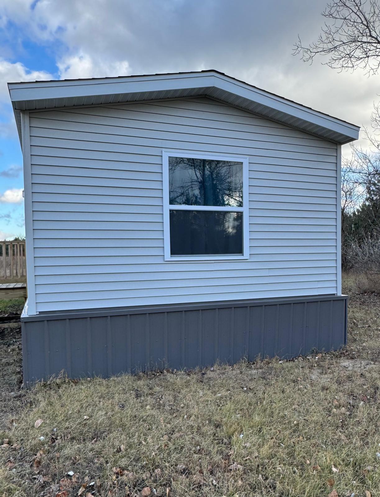 8177 Cedar River Road Mancelona, MI 49659 - Photo 4 of 14 50194910-5c34142f-afda-41b1-823f-265439d28490.JPG