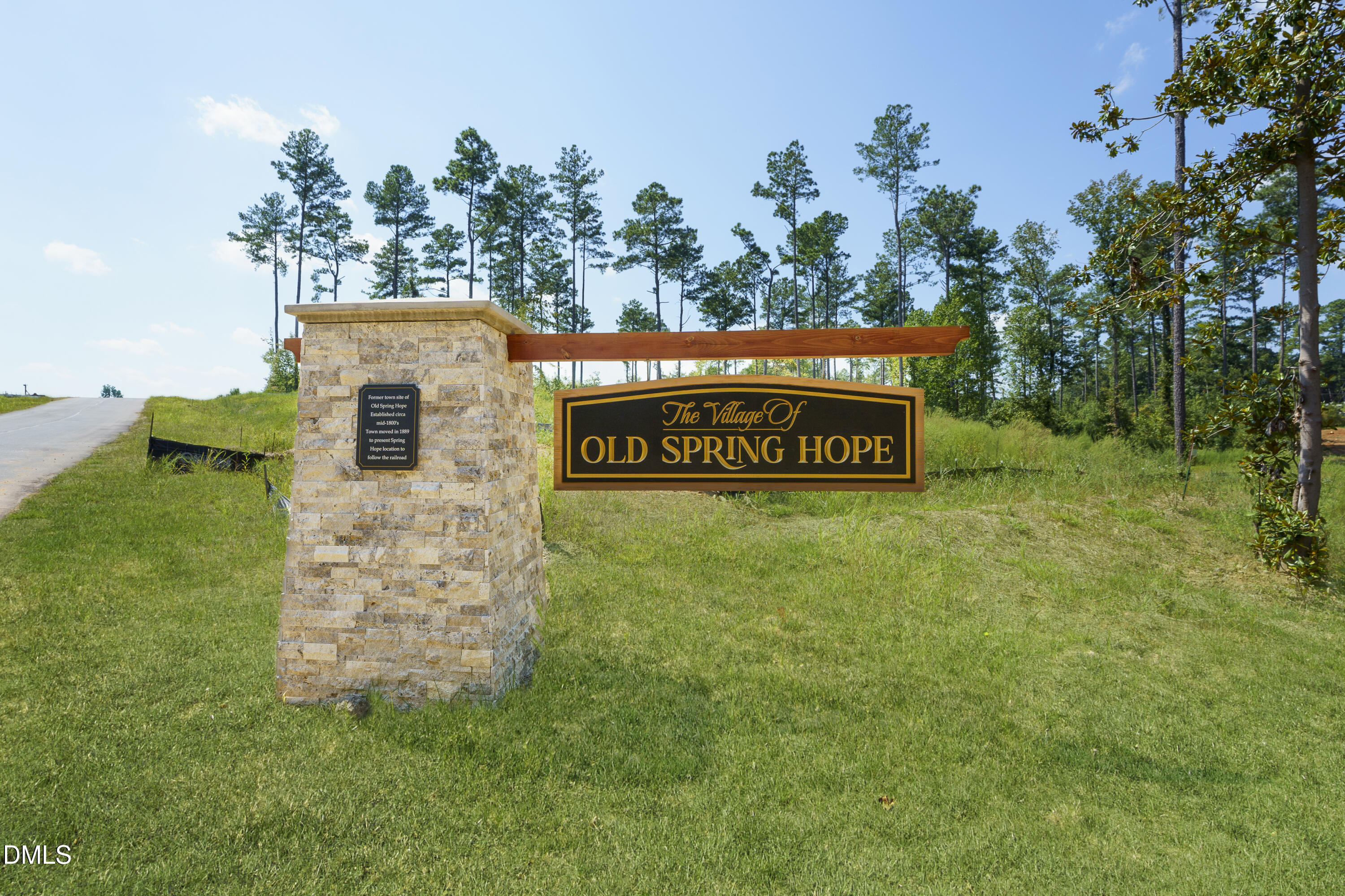 2709 River Meadow Spring Hope, NC 27882 - Photo 5 of 5 a sign of golf club on a wall under a tree