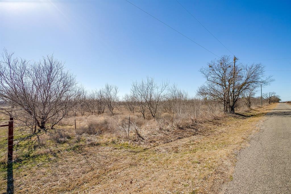 Tbd Ivy Lane Elm Mott, TX 76640 - Photo 15 of 18 a view of a yard with trees
