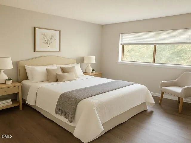 a bedroom with bed and a window