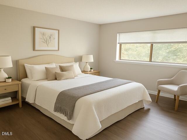 a bedroom with bed and a window