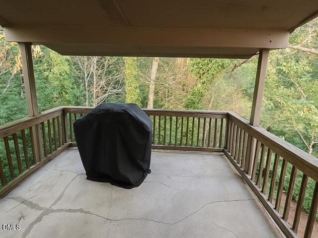 635 Pine Ridge Place Raleigh, NC 27609 - Photo 11 of 11 a view of a blue chair in a balcony