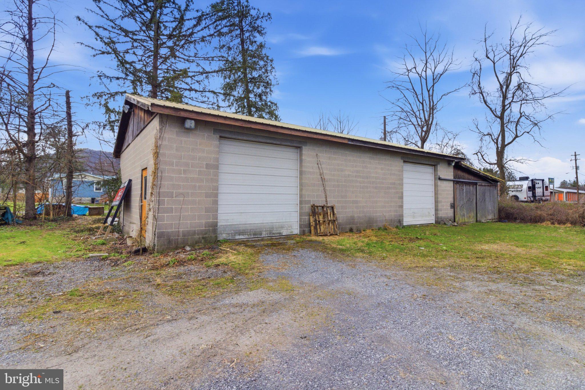 3250 Eagle Valley Road Mill Hall, PA 17751 - Photo 26 of 31 Spacious garage with potential charm.