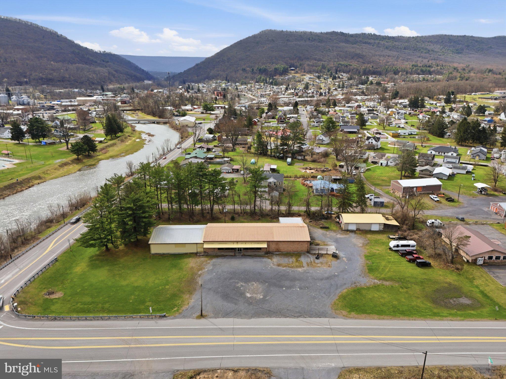 3250 Eagle Valley Road Mill Hall, PA 17751 - Photo 5 of 31 Scenic riverside view with mountains.