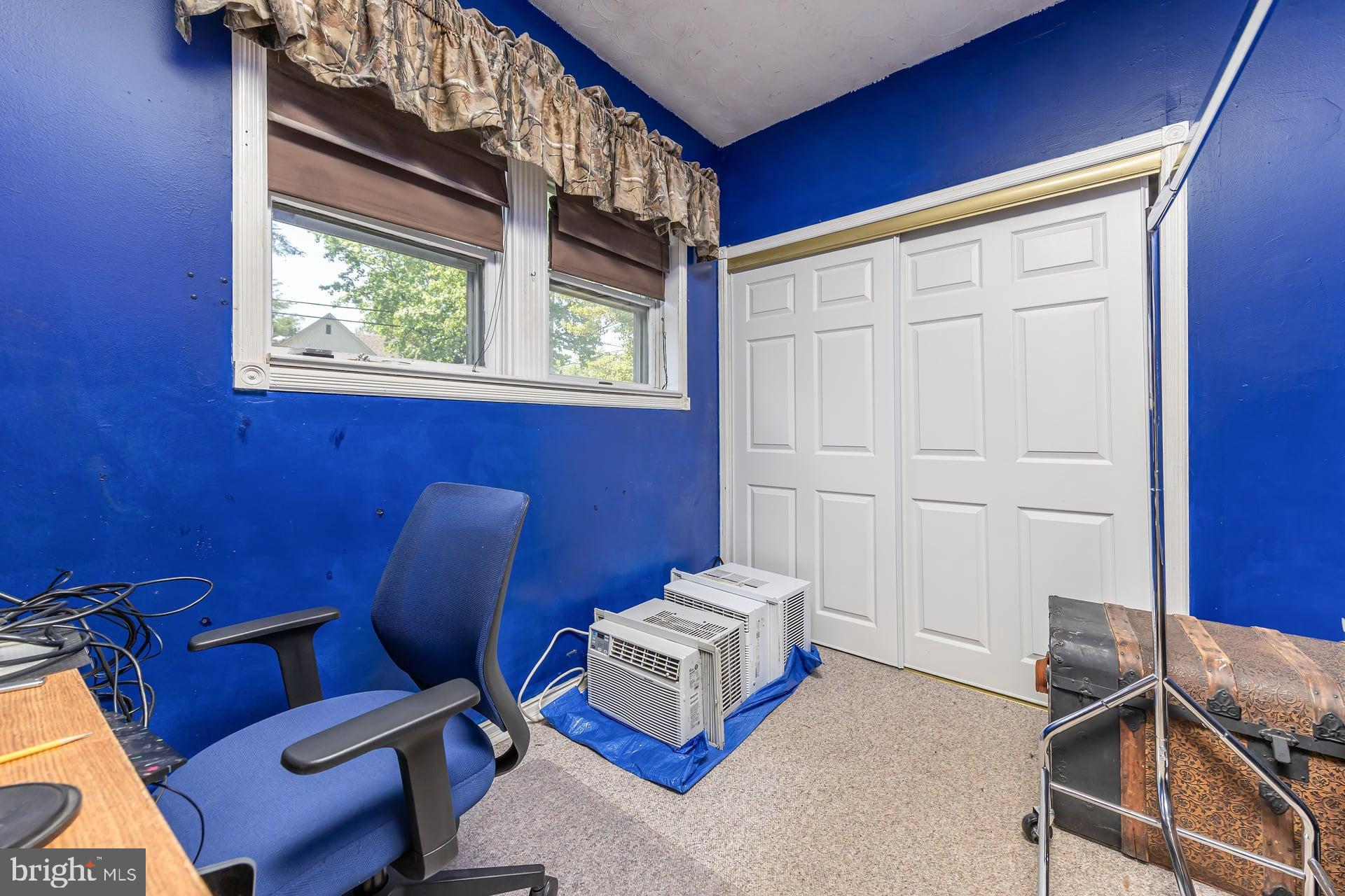 401 West Avenue Delanco, NJ 08075 - Photo 11 of 19 a living room with furniture and a window