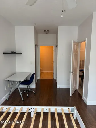a view of a livingroom with furniture and a rug