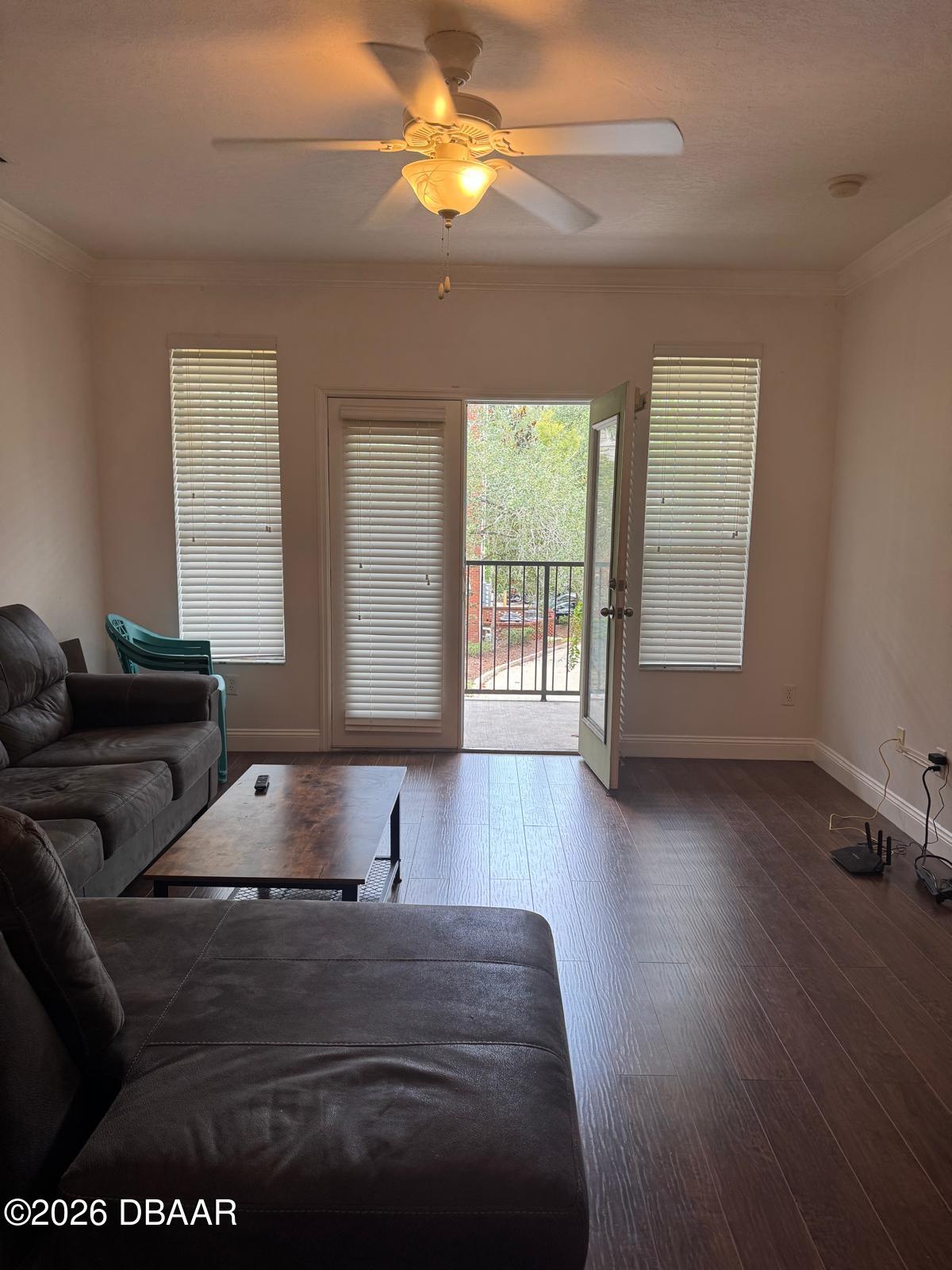 1185 Southwest 9th Road Gainesville, FL 32601 - Photo 2 of 25 a living room with furniture and a window