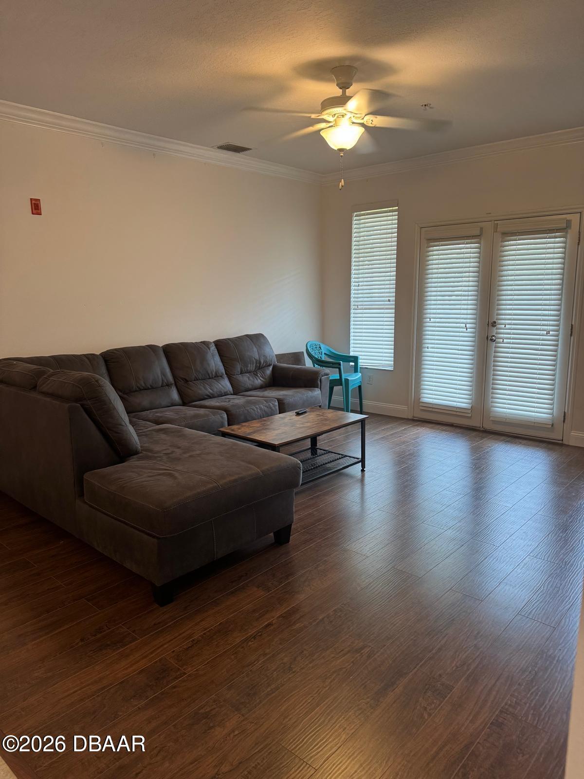 1185 Southwest 9th Road Gainesville, FL 32601 - Photo 3 of 25 a living room with furniture and a wooden floor