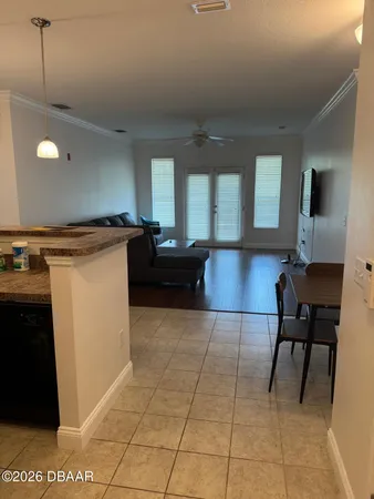 a lobby with furniture and rug