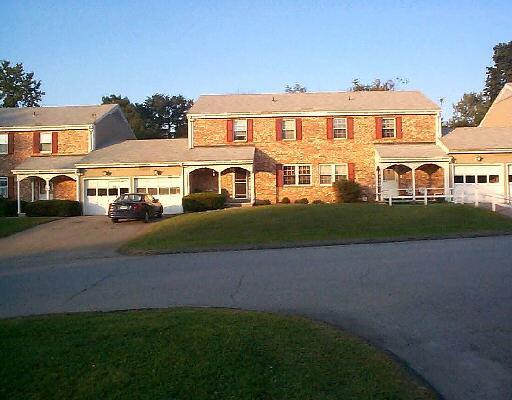 37 Whisconier Road, Unit 37 Brookfield, CT 06804 - Photo 1 of 1 a front view of a house with a yard