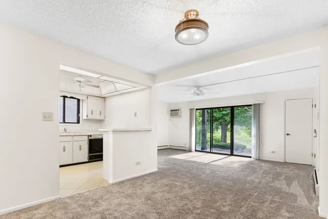 a view of a kitchen with a sink dishwasher and a refrigerator