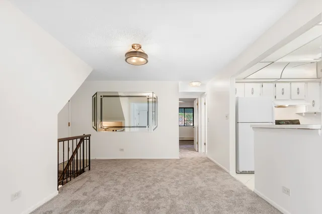 a view of a kitchen with a sink