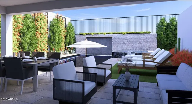 a view of a patio with table and chairs and potted plants