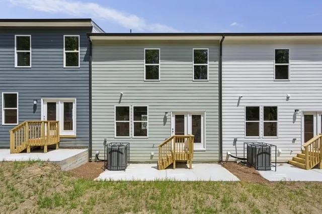 a backyard of a house with seating space