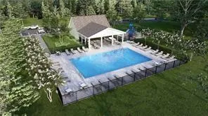 an aerial view of a house having yard