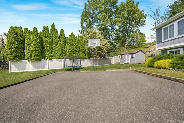 a view of a park with large trees