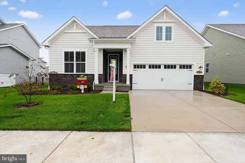 a view of a house with a garden