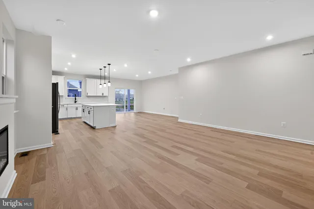 a view of kitchen with wooden floor
