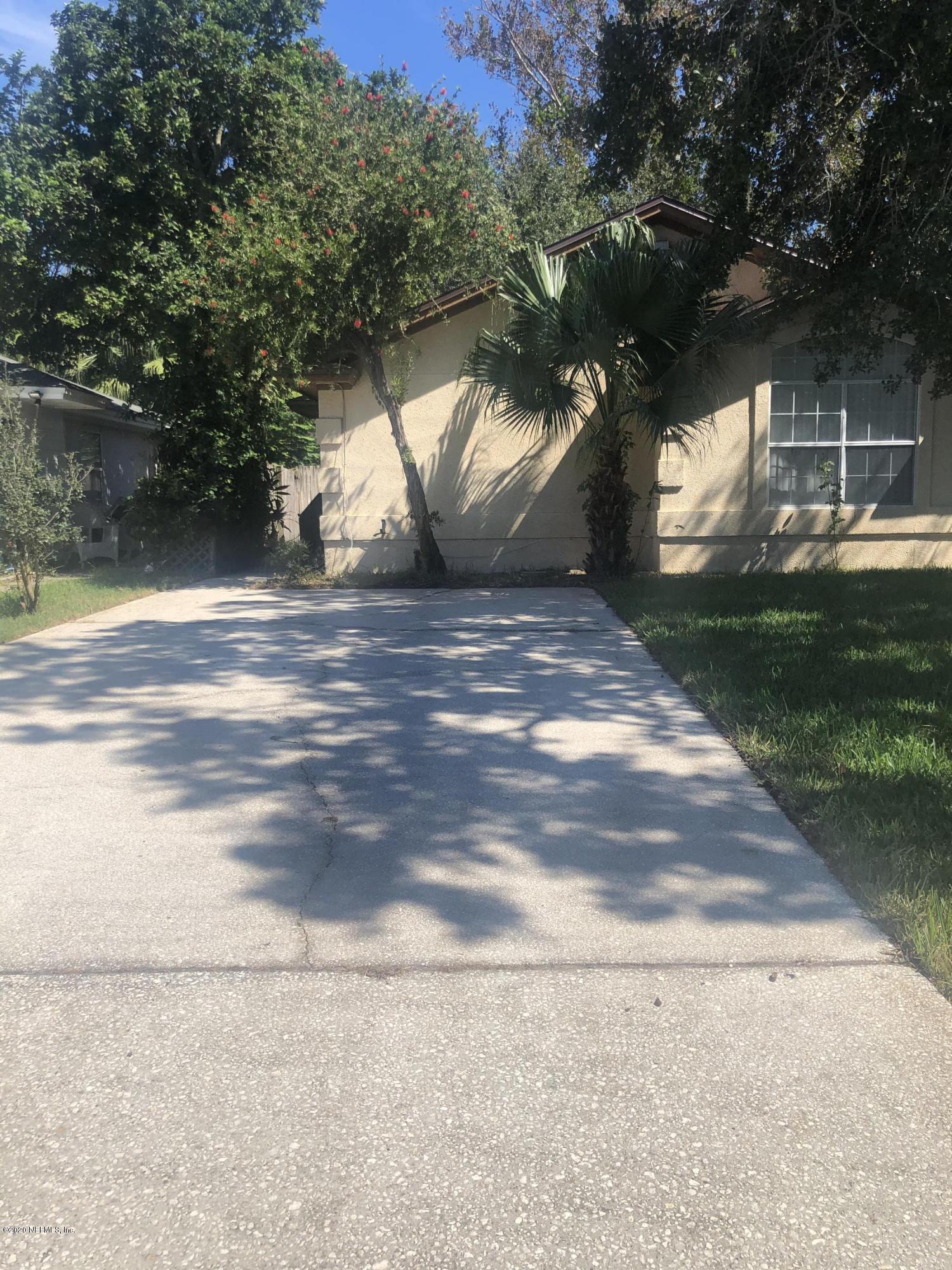 141 Jasmine Street Atlantic Beach, FL 32233 - Photo 2 of 23 a view of yard