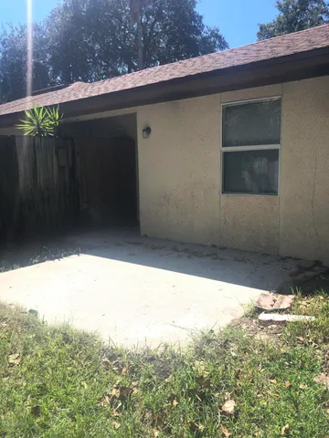 a view of a yard from a balcony