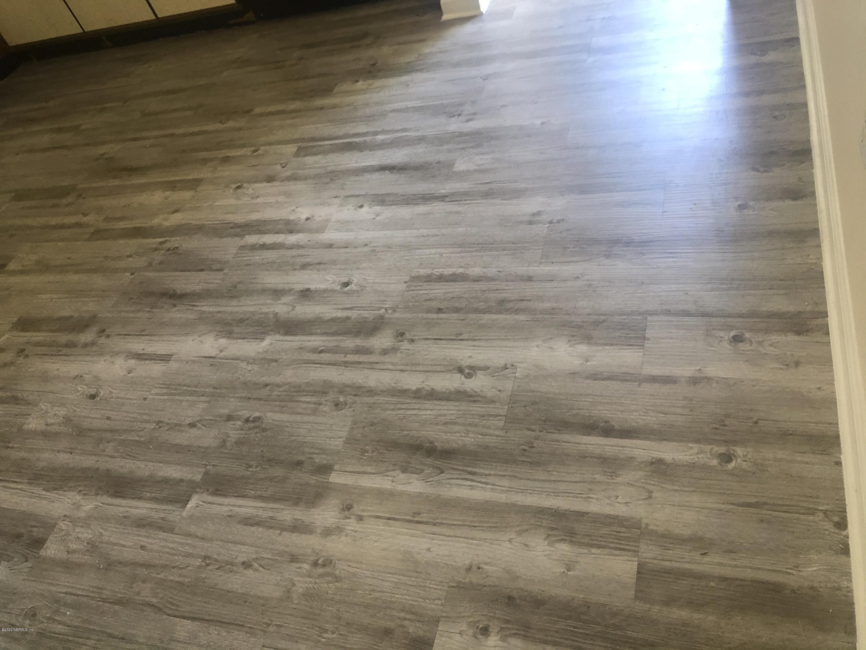 141 Jasmine Street Atlantic Beach, FL 32233 - Photo 8 of 23 a bathroom with a shower