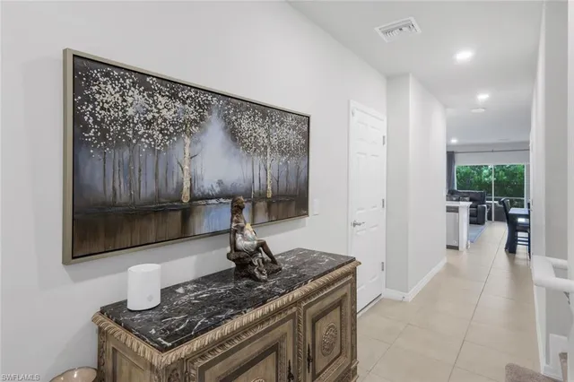 a kitchen with a stove and a wooden cabinets