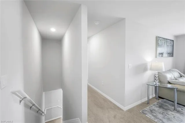 a room with furniture and a window