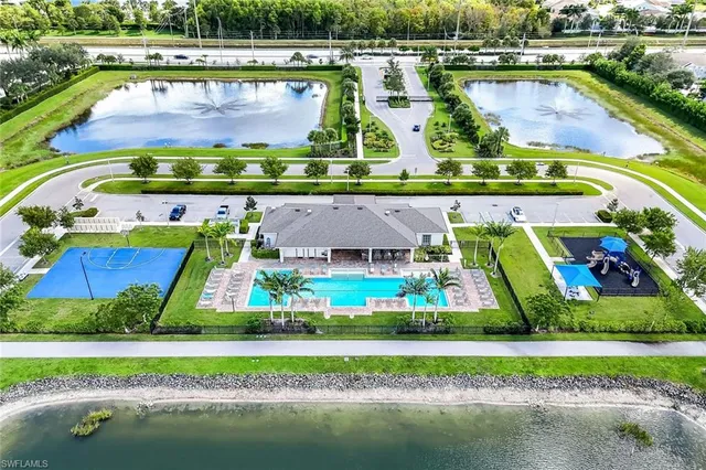 a view of swimming pool with a yard and outdoor seating