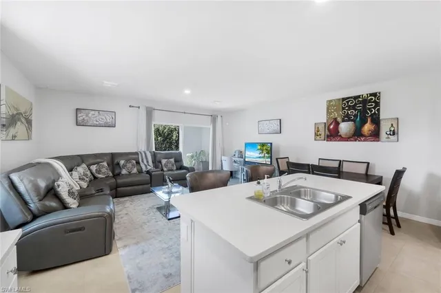 a living room with furniture and a table