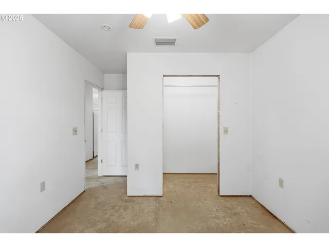 a view of a bathroom with sink and window