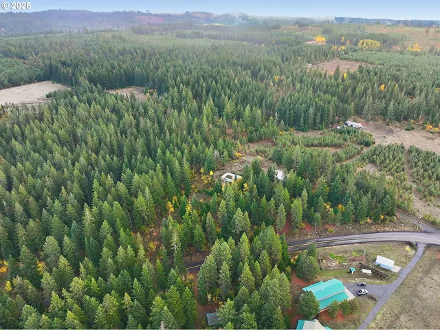 a view of a lake with green field