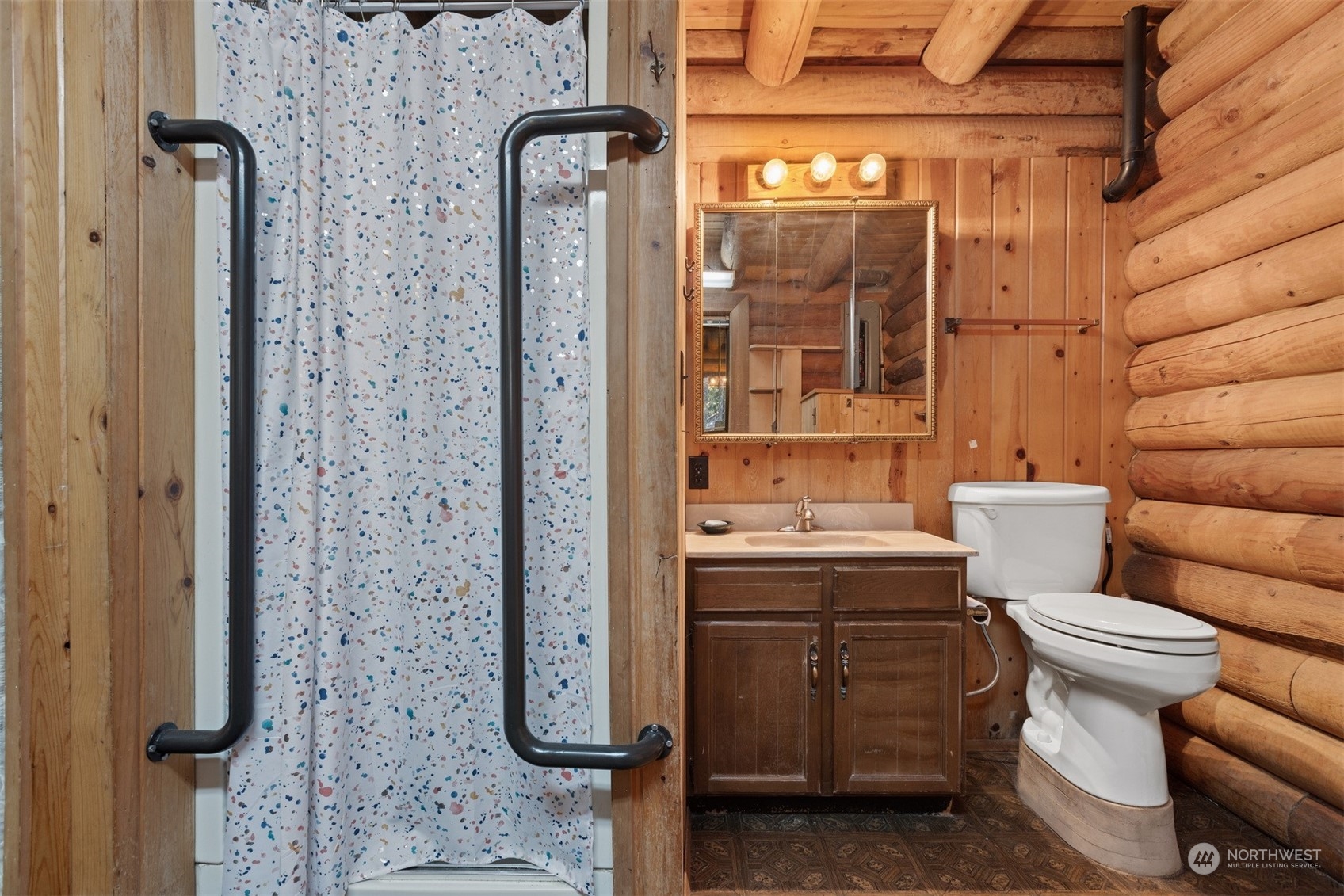 7527 Cemetery Road Maple Falls, WA 98266 - Photo 14 of 40 a bathroom with a sink a toilet and shower