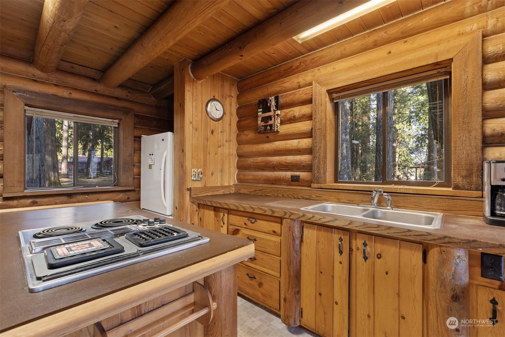 7527 Cemetery Road Maple Falls, WA 98266 - Photo 17 of 40 a stove top oven sitting inside of a kitchen
