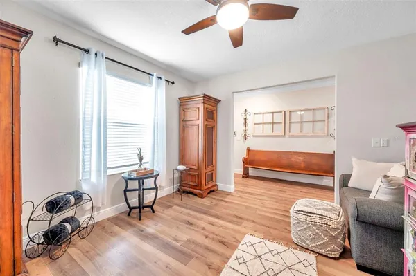 a living room with furniture and a rug