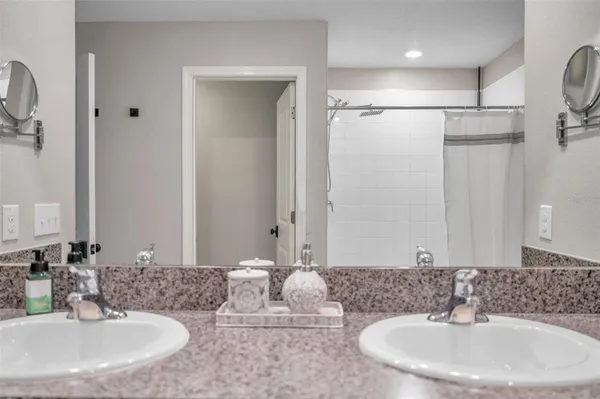 a view of a swimming pool with a patio