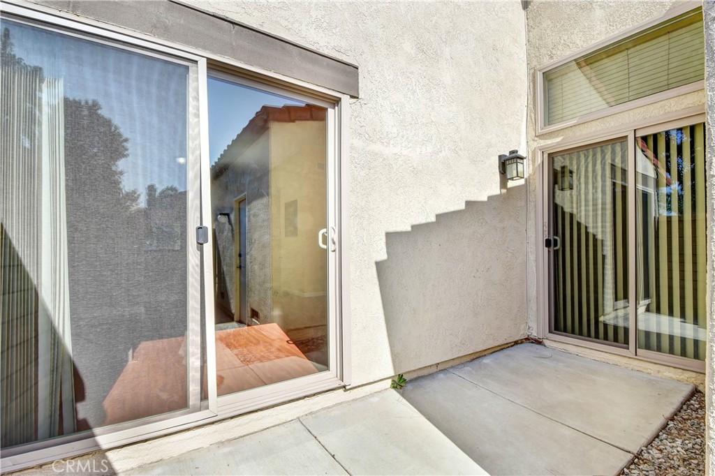 7858 Peralta Road Rancho Cucamonga, CA 91730 - Photo 13 of 14 a view of a bathroom with a glass door and shower
