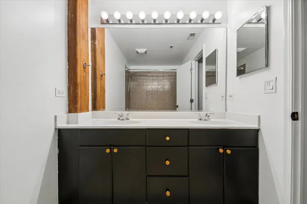 a bathroom with a toilet and a bathtub