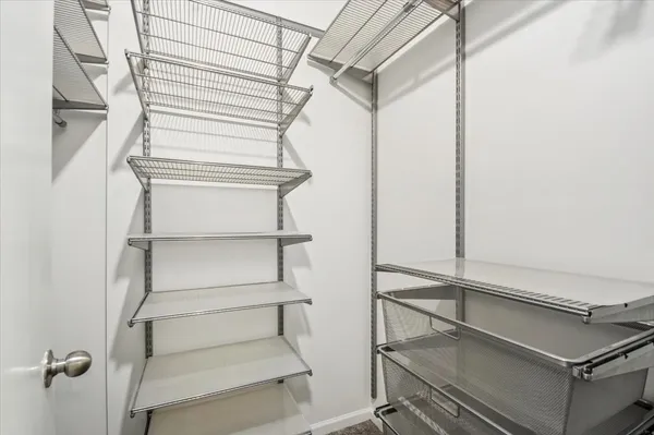 a bathroom with a double vanity sink and mirror