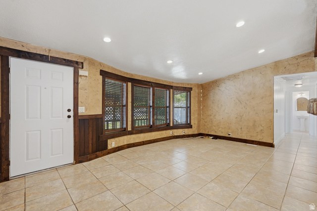 2875 North Hill Field Road, Unit 111 Layton, UT 84041 - Photo 11 of 30 Foyer featuring wallpapered walls, recessed lighting, and light tile patterned floors