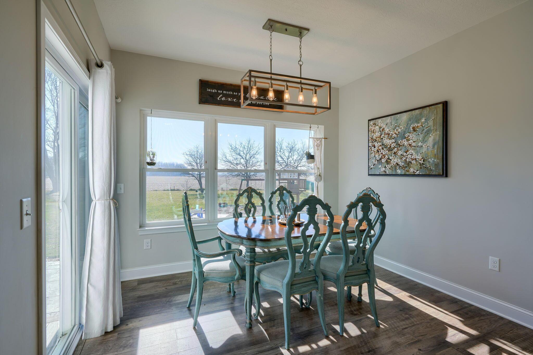 8050 Kilbourne Road Sunbury, OH 43074 - Photo 16 of 56 Bright Dining Room right off the Kitchen