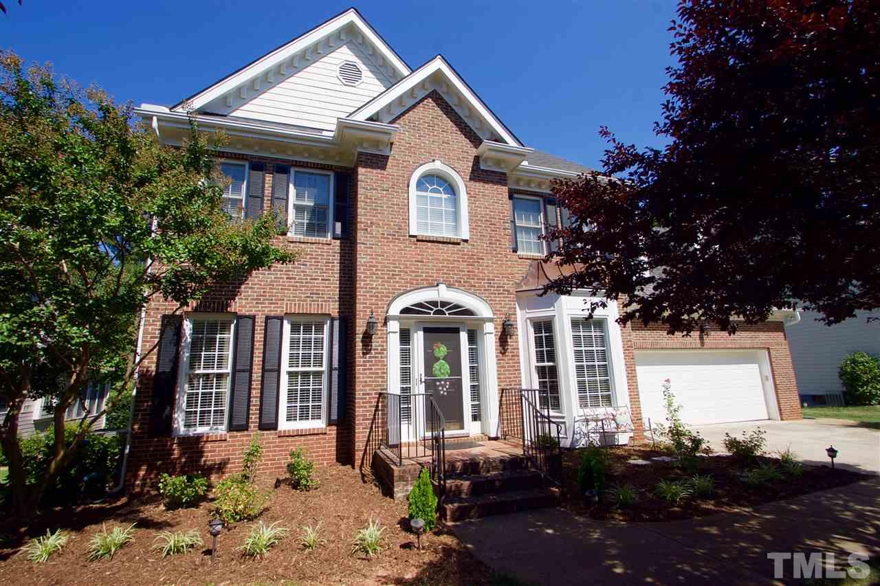 8208 Gadsen Court Raleigh, NC 27613 - Photo 1 of 25 a front view of a house with a yard