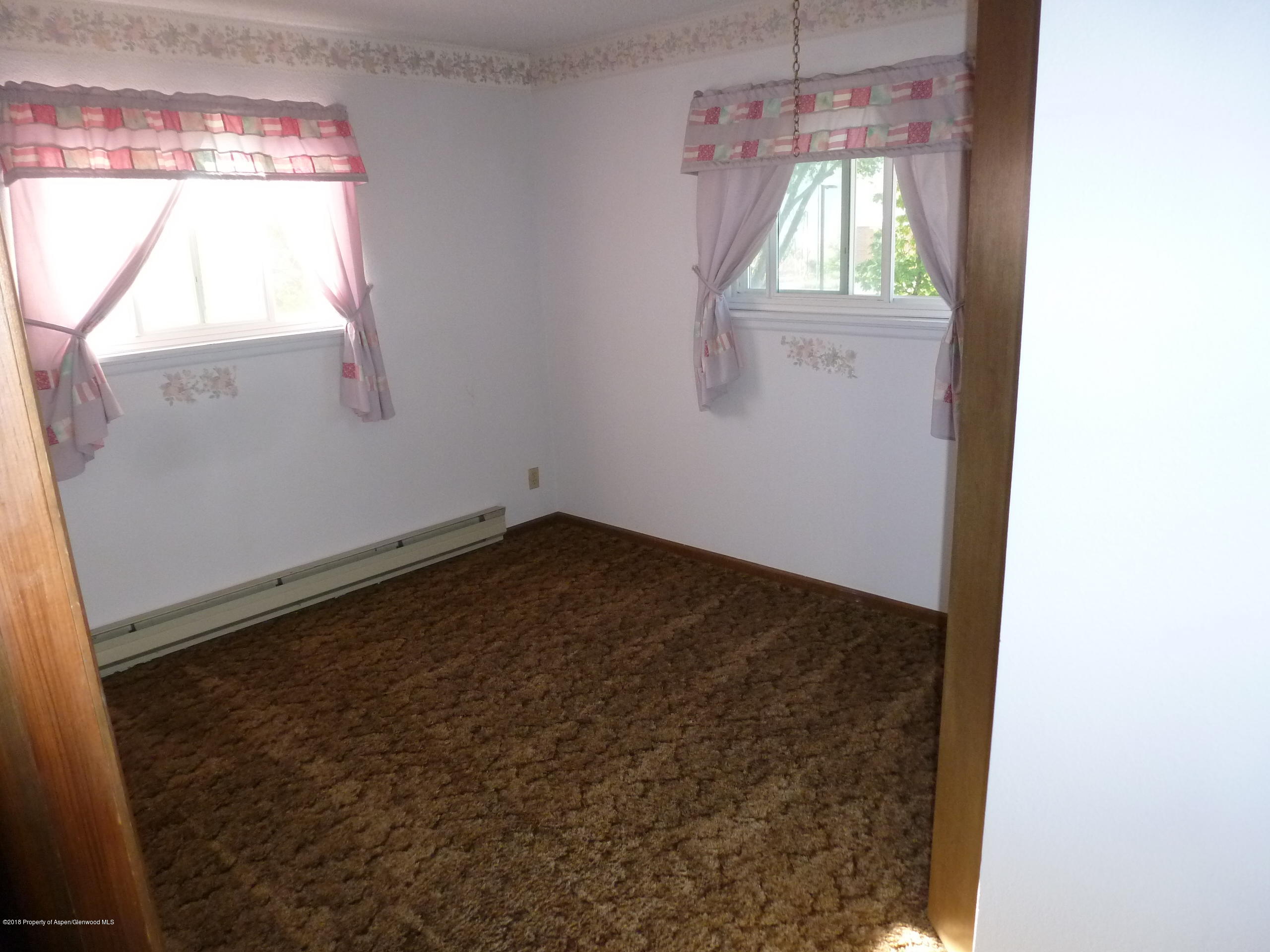 810 East 5th Street Rifle, CO 81650 - Photo 6 of 13 a view of empty room with window