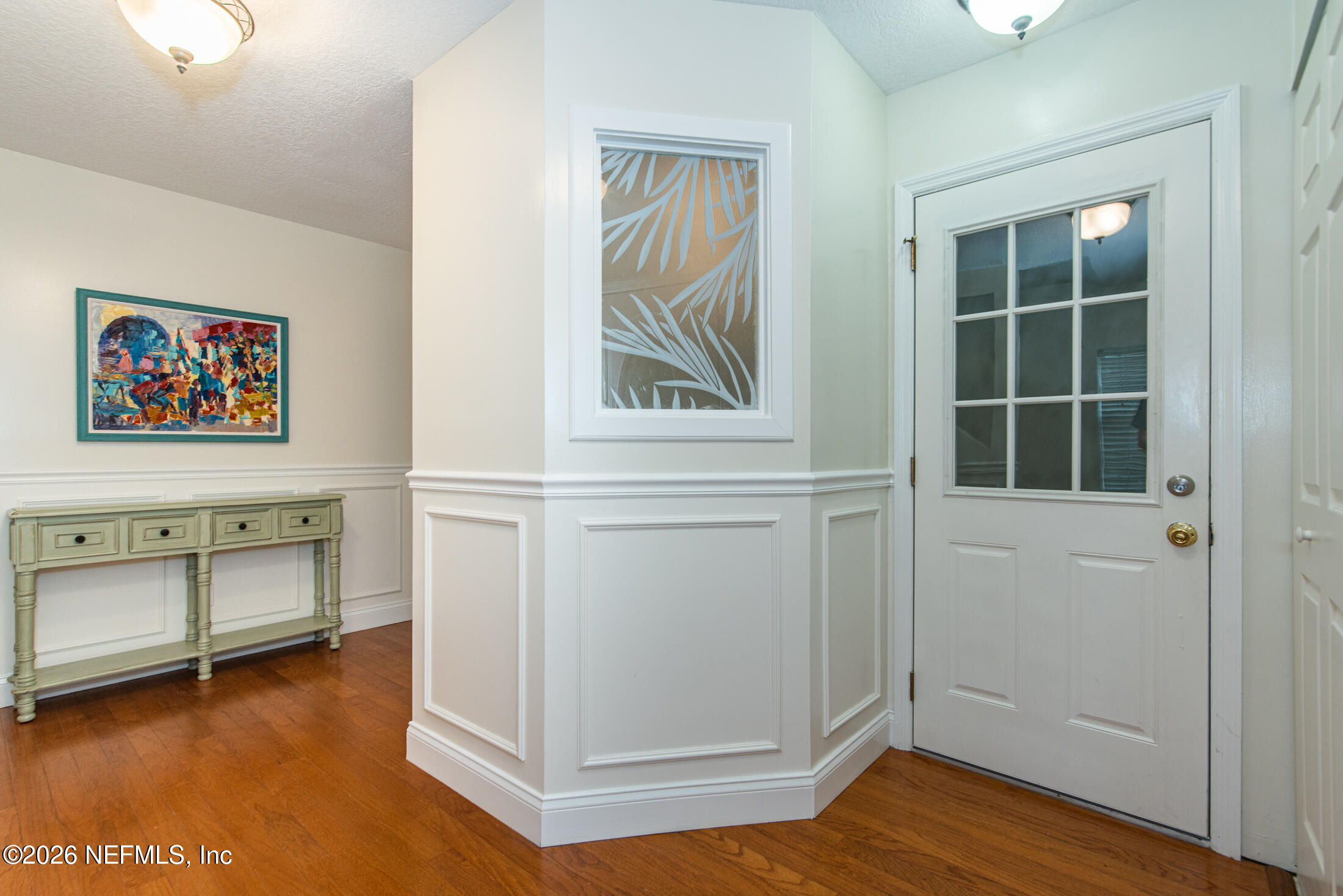 35 Oak Street St. Augustine, FL 32084 - Photo 12 of 43 an entryway with wooden floor and cabinet